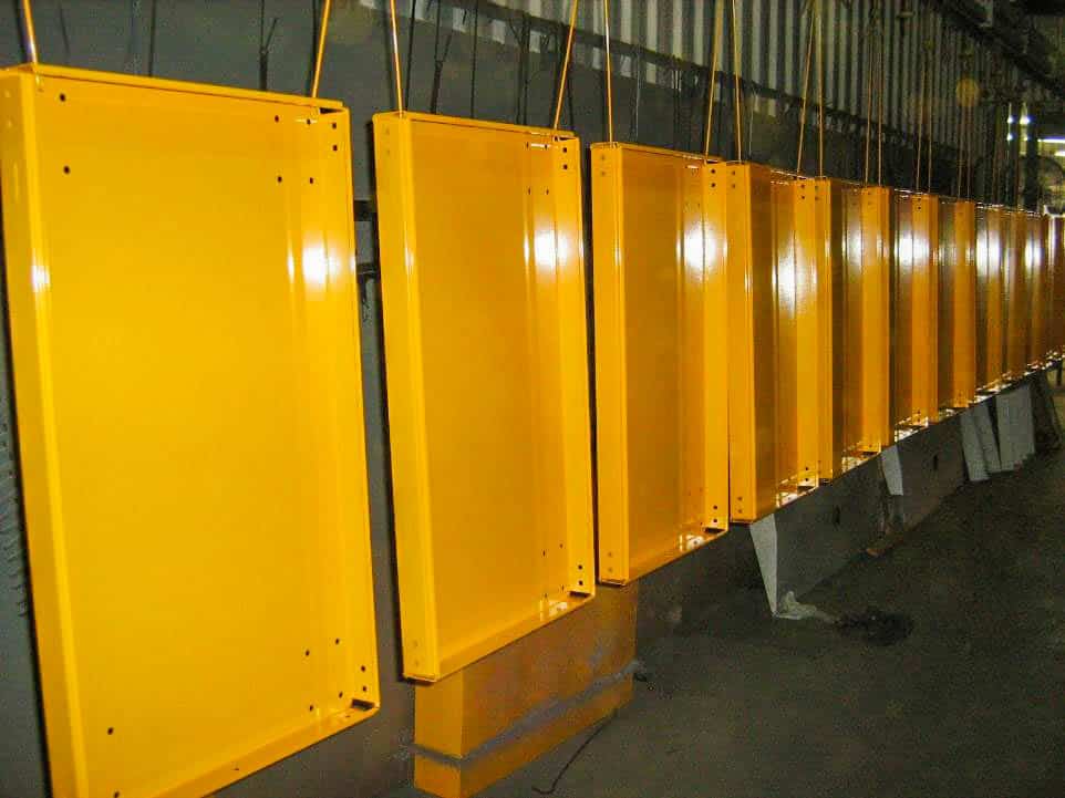 A line of yellow boxes in the Liberty Powder Coating warehouse in Michigan.